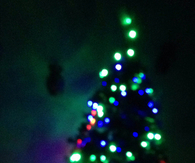 Decorated christmas tree in the dark