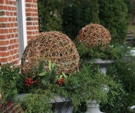 Wire ornaments with holly berry posts