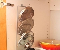 Organize pot lids with magazine rack