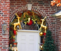 Gold reindeer and nutcracker decoration