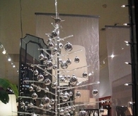 Plastic christmas tree with silver ornaments