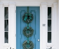 Three evergreen wreaths