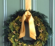 Golden cedar wreath