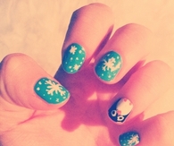 Snowflake and penguin nail art