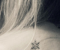 Small snowflake tattoo