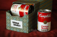 Empty soda boxes to store soup cans