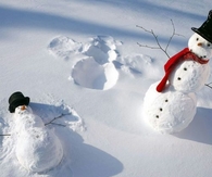 Snowman making snow angels