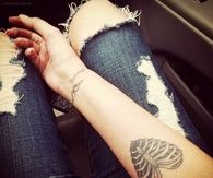 Skeleton heart tattoo