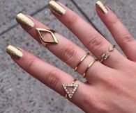 Gold jewelry and nails