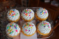 Vanilla cupcakes with sprinkles