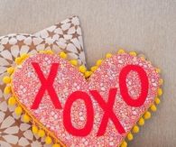 Heart shaped phrase pillow