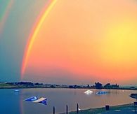Bright Rainbow over Water