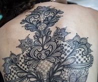 Detailed cross tattoo