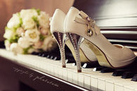 Pretty Heels with Bling on a piano