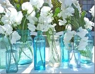 Mason Jars Filled with White Flowers