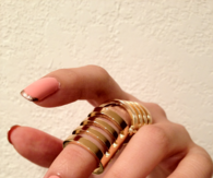 Gold tipped pink nails