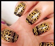 Yellow and black aztec nails