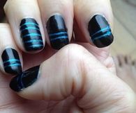 Blue striped black nails