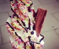 Vanilla and chocolate sprinkle swirl ice cream