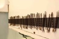 Magnetic strip for bobby pins