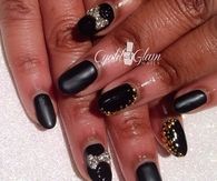 Black and gold bow stud nails