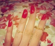 Red nails and pretty rings