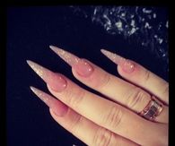 Long stiletto glittery nails