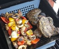 BBQ steak with onions, potatoes and veggies
