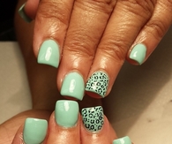 Spring green cheetah nails