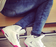 White and pink jordans