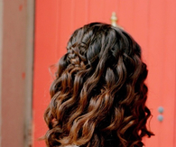 Curly brunette hair