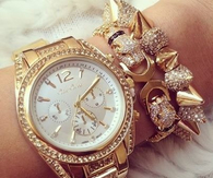 Gold diamond watch and bracelets