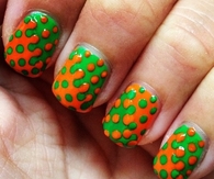 Orange and green splatter nails