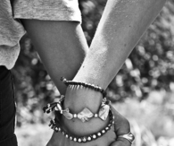 Friends holding hands