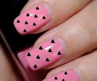 Heart patterned pink nails