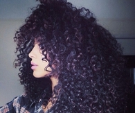 Dark curly hair