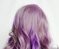 Blonde and purple curly hair