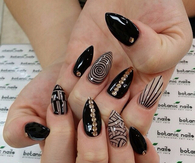 Black and gold designed nails