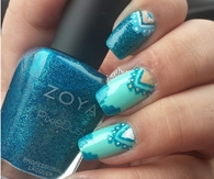 Blue tribal nail design