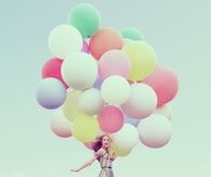 floating with balloons
