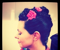 Braided updo with roses