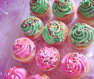 Pink and green sprinkled cupcakes