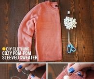 Pom pom sleeved sweater