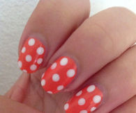 Orange polka dot nails