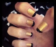 Gold nails with black tips