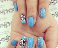Zebra print blue glitter nails