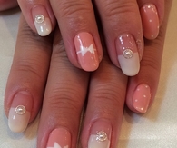 Pink bow and polkadot nails