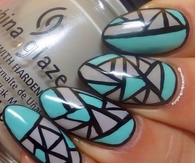Turquoise and grey aztec nails