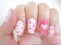 Pink and white polkadot nails