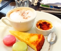 Cappuccino with macaroons and lemon cake